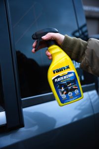 Someone using the Rain-X Plastic restorer